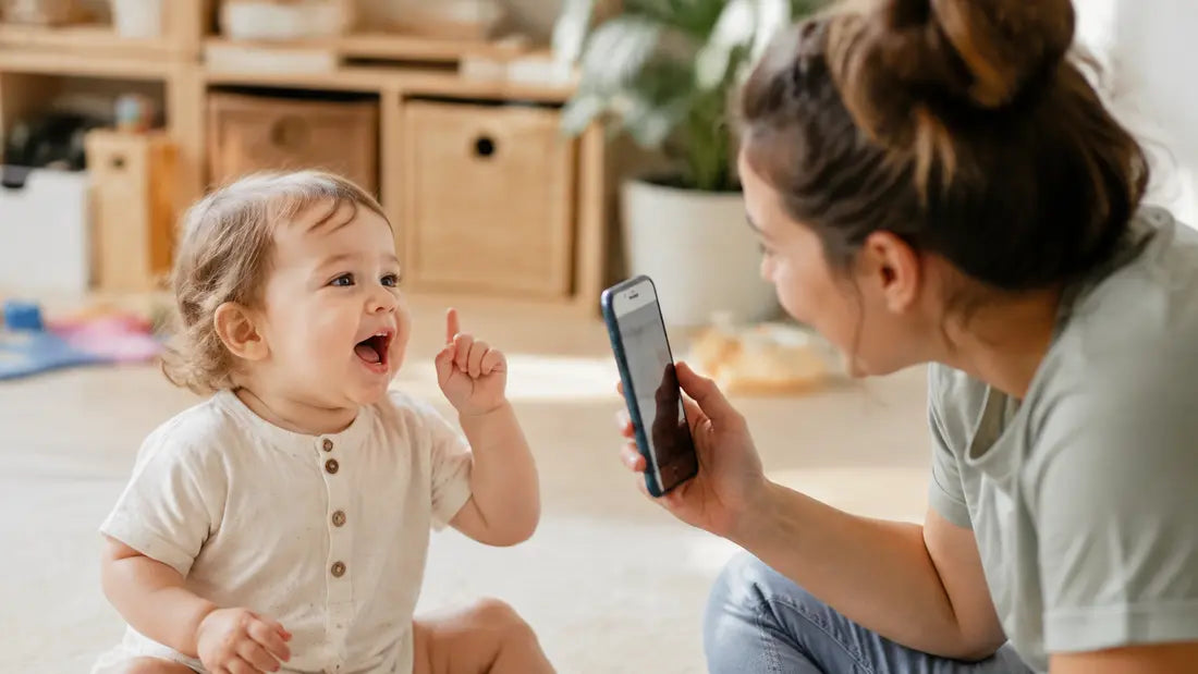 A parent recording a toddler's first words